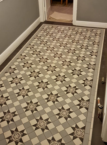 Geometric Grey Victorian Tiles In Hallway